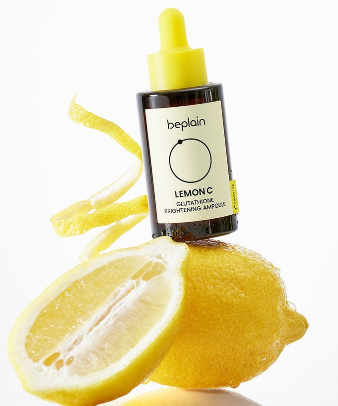 BEPLAIN Lemon Seed Glutathione Whitenning Ampoule 30ml bottle with fresh lemon backdrop
