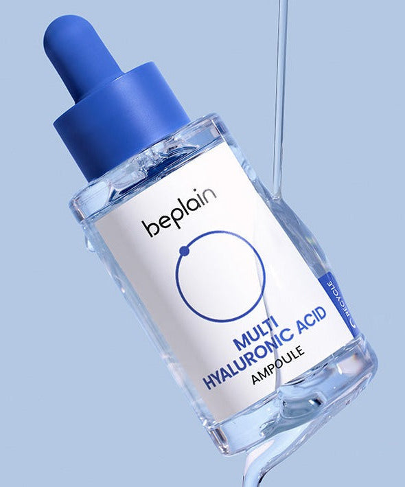 BEPLAIN Multi Hyaluronic Acid Ampoule 30ml in transparent bottle with blue dropper against a light blue background