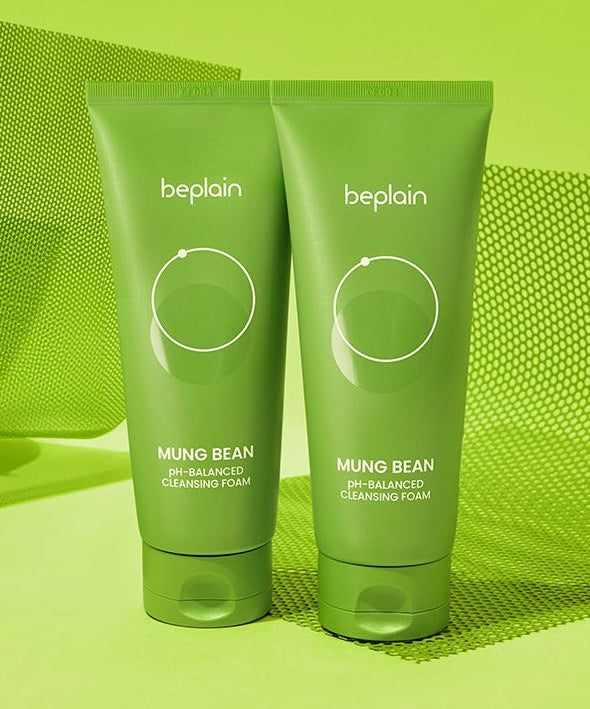 BEPLAIN Mung Bean pH-Balance Cleansing Foam on a green background, emphasizing skincare benefits and natural ingredients.
