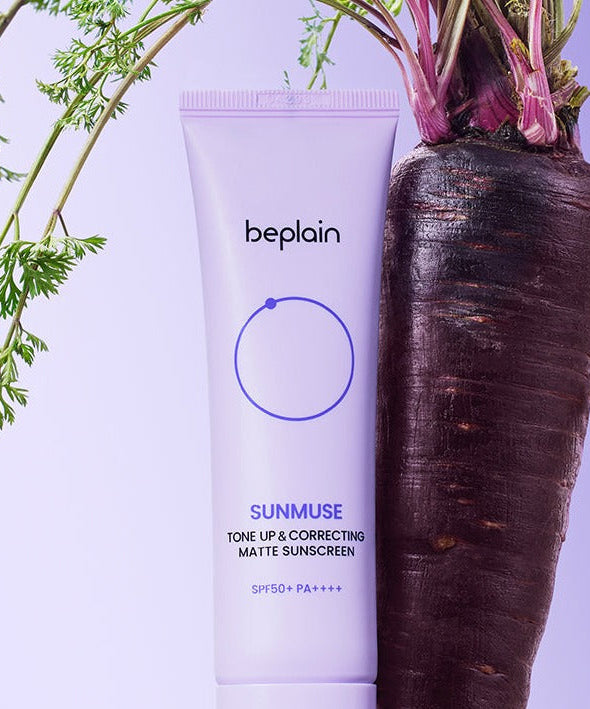 BEPLAIN Sunmuse Toneup & Correting Matte Sunscreen SPF50+ PA++++ 50ml showcased with a purple carrot