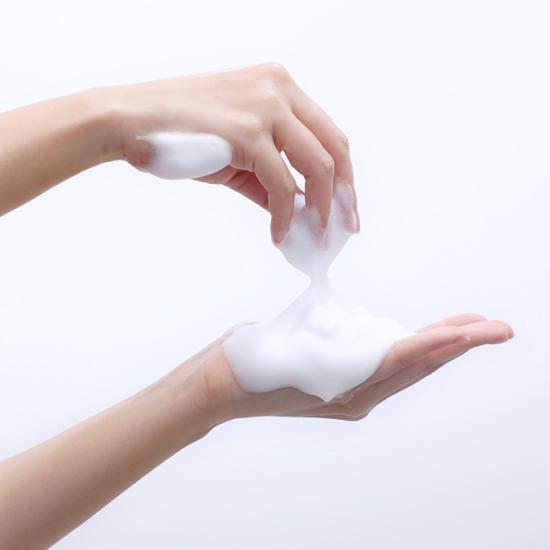 Hands using BIO HEAL BOH Panthecell Repair Cica Soothing Cleanser 160mL with foam texture shown.