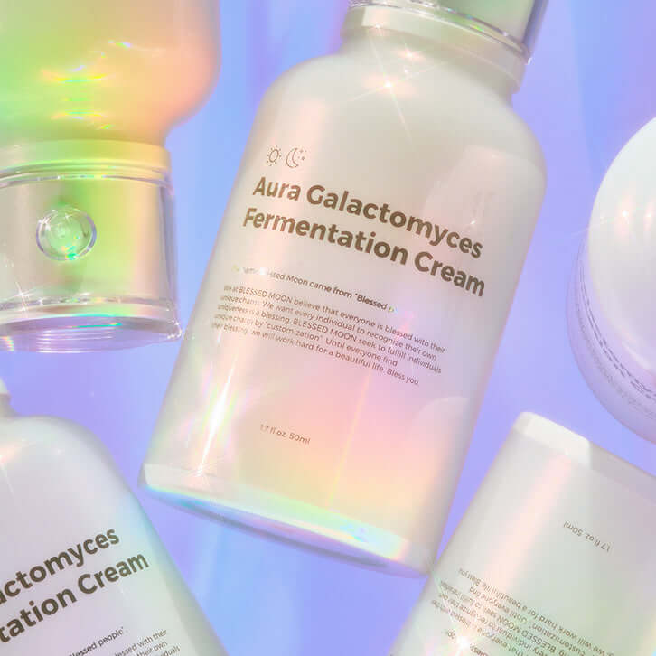 BLESSED MOON Aura Galactomyces Fermented Cream 50ml product packaging with iridescent glow and text visible on light background.