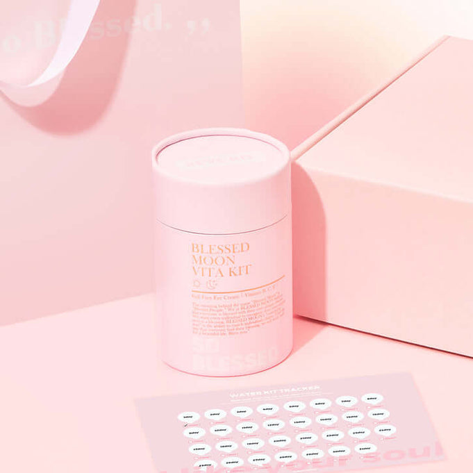BLESSED MOON Water Kit in pastel pink packaging on a matching background, showcasing elegant design and premium product.