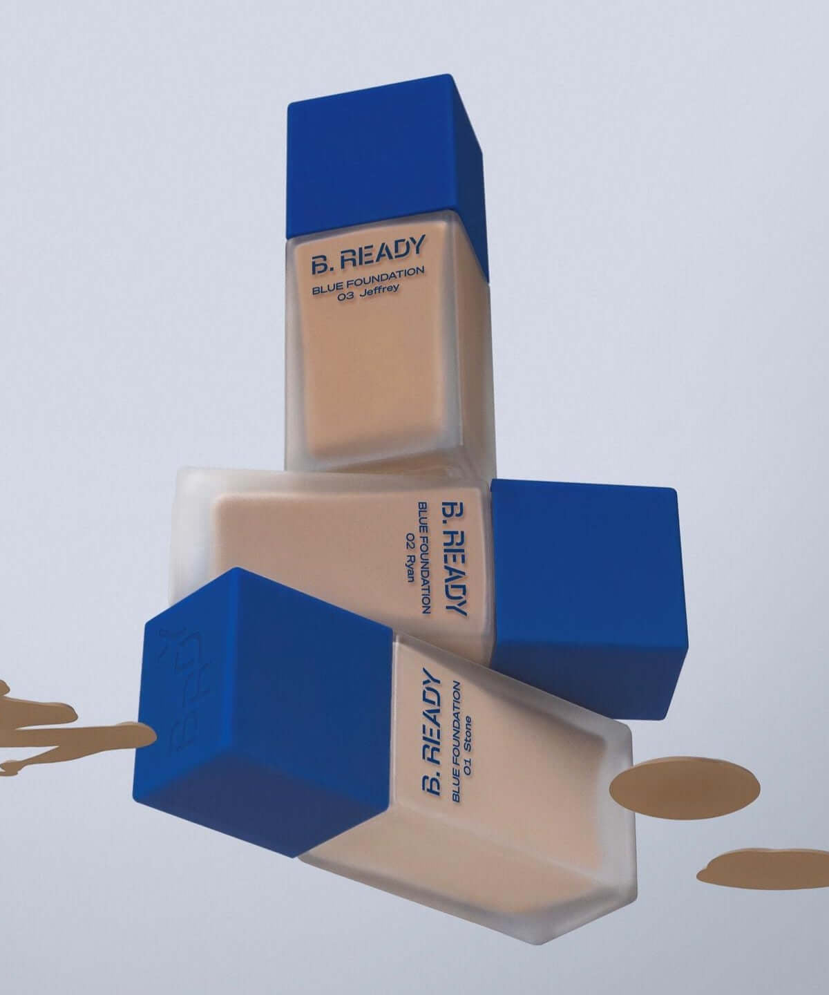 B.READY Blue Foundation in striking bottles with vibrant blue caps. Perfect for flawless complexion.