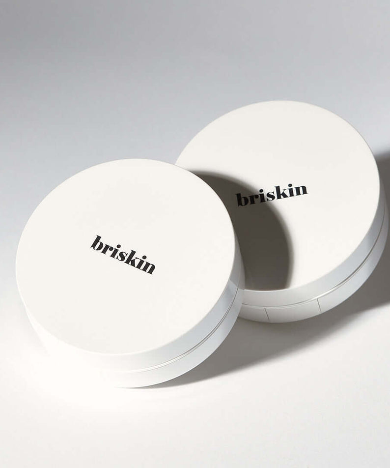 BRISKIN Exo-Glow Secondskin Cushion 15g product packaging, showcasing sleek minimalist design.