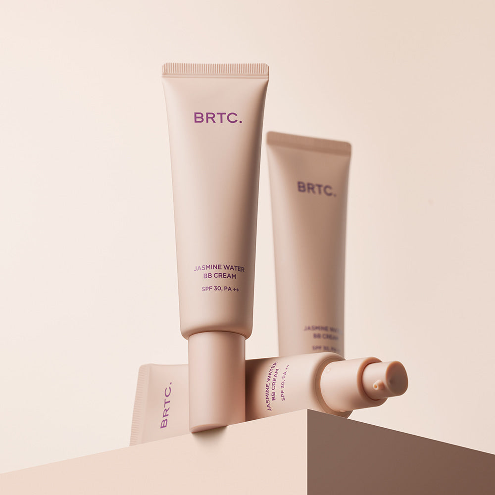 BRTC Jasmine Water BB Cream 60g tubes on a pastel background