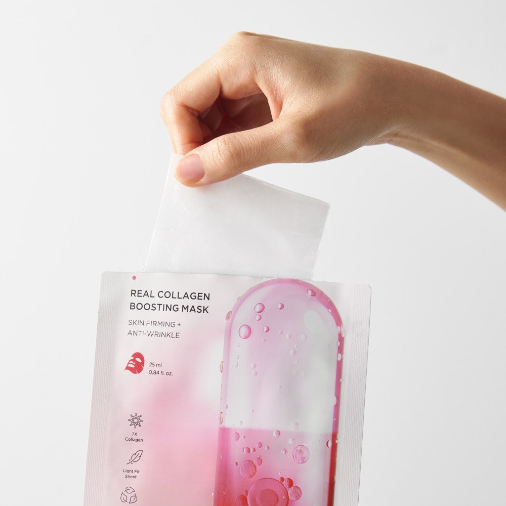 Hand holding BRTC Real Collagen Bosting Mask 10 Sheets, pink packaging for skin firming, anti-wrinkle benefits