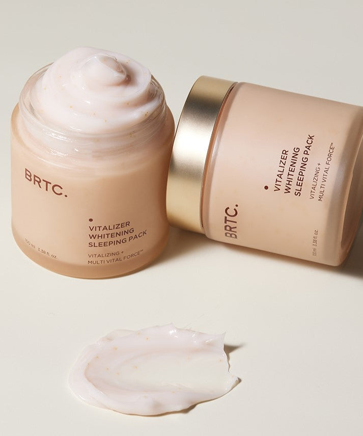 BRTC Vitalizer Whitening Sleeping Pack 100ml open jar with textured cream and lid beside, demonstrating skincare product texture.