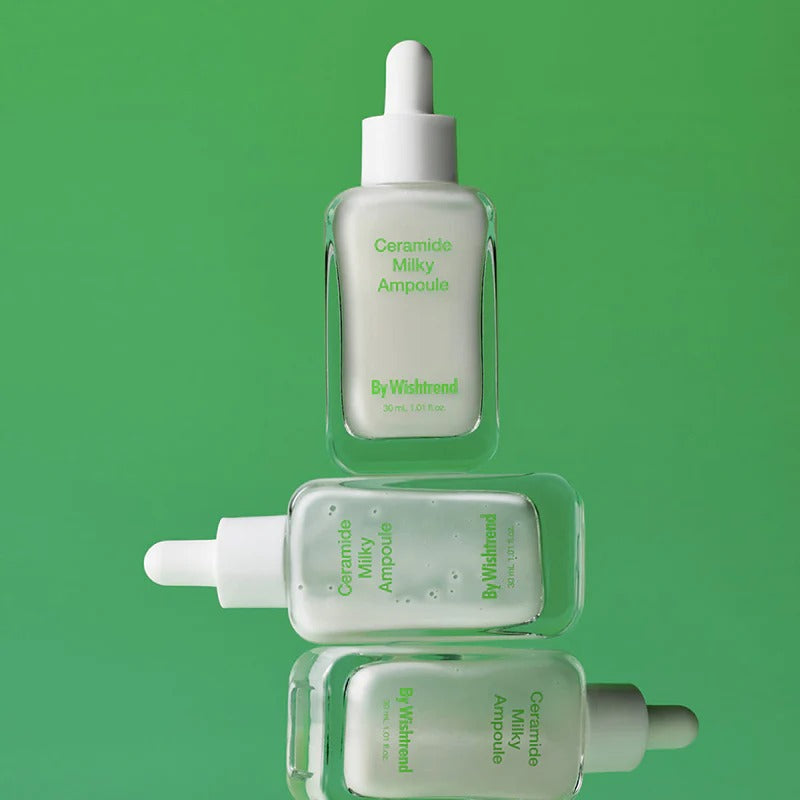 BY WISHTREND Ceramide Milky Ampoule 30ml product image with green background and glass dropper bottle.