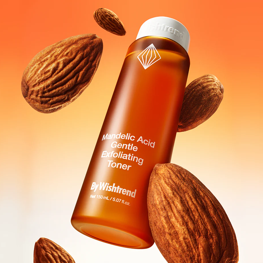 BY WISHTREND Madelic Acid Gentle Exfloliating Toner 150ml bottle with almonds on orange gradient background