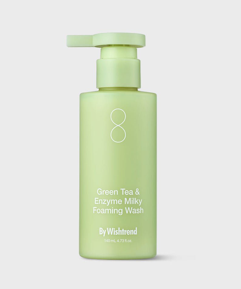 BY WISHTREND Green Tea & Enzyme Milky Foaming Wash 140ml in a light green pump bottle on a white background.