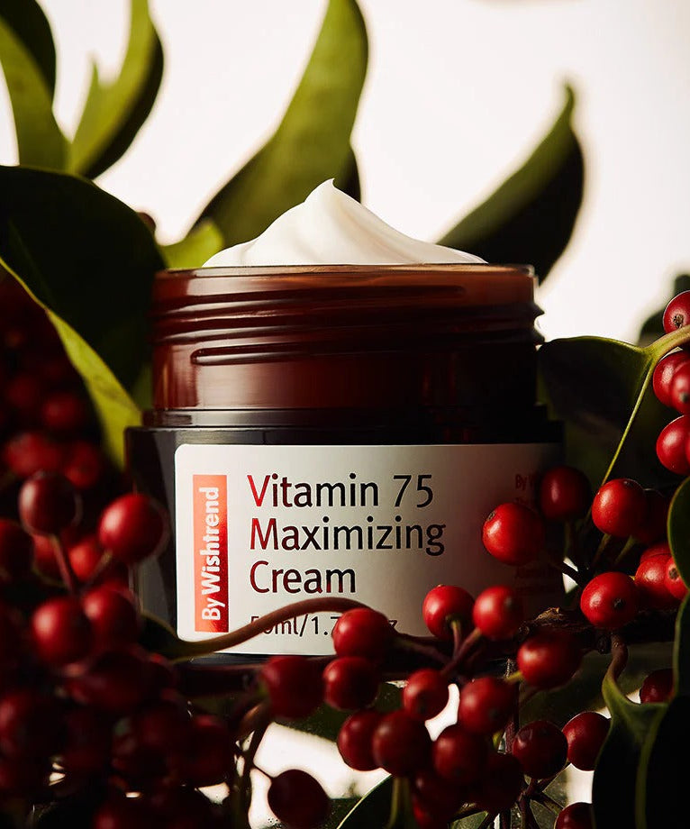 BY WISHTREND Vitamin 75 Maximizing Cream 50g surrounded by red berries and green leaves.