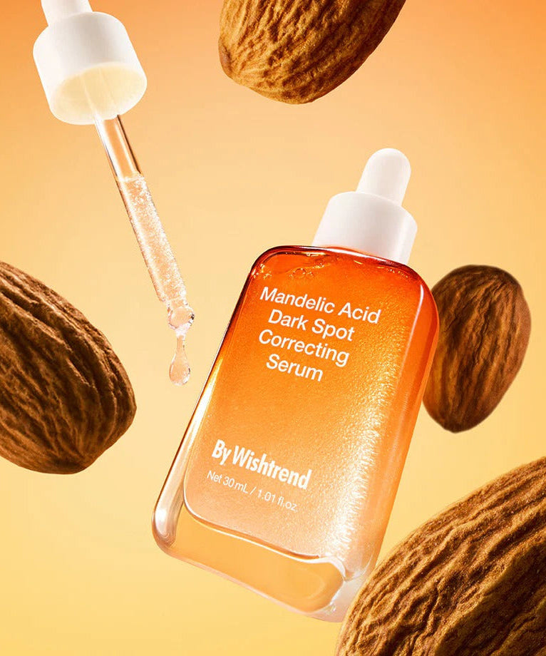 BY WISHTREND Mandelic Acid Dark Spot Correcting Serum 30ml bottle with dropper and almonds background