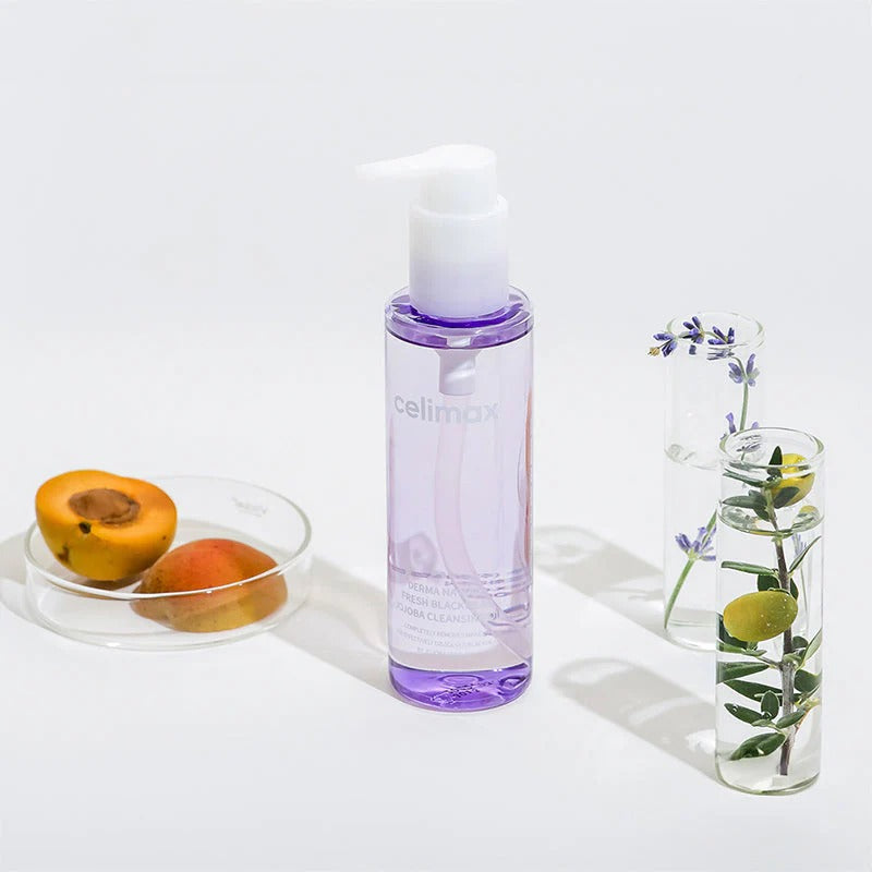 CELIMAX Derma Nature Fresh Blackhead Jojoba Cleansing Oil 150ml bottle with natural ingredients displayed around.
