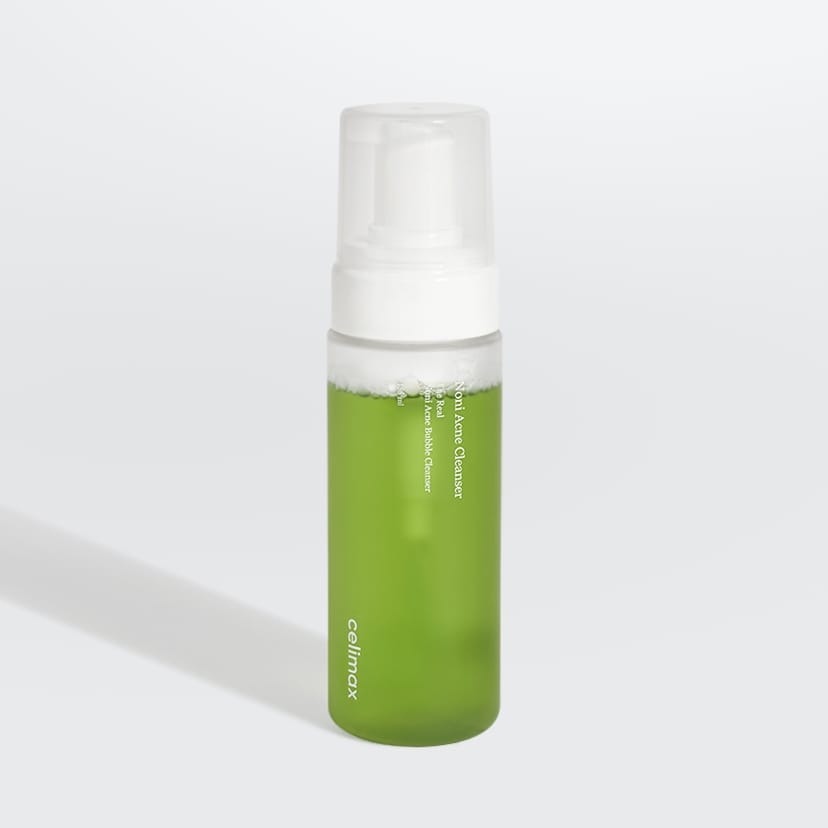 CELIMAX The Real Noni Acne Bubble Cleanser 155ml green bottle on white background