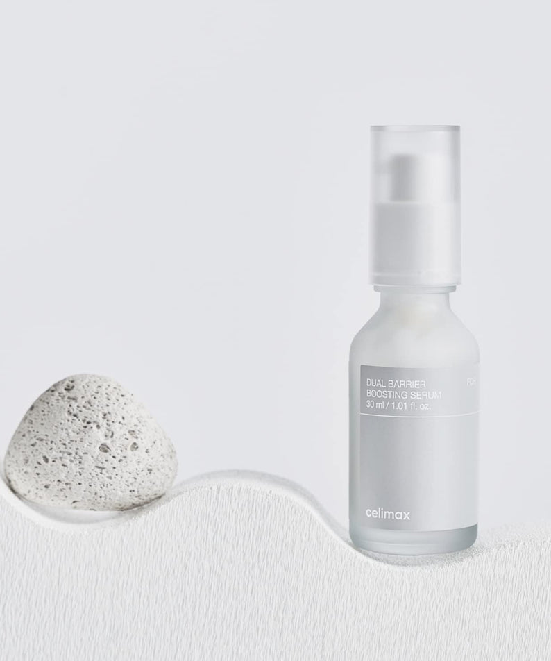 CELIMAX Dual Barrier Boosting Serum 30ml bottle displayed on a minimalist background.