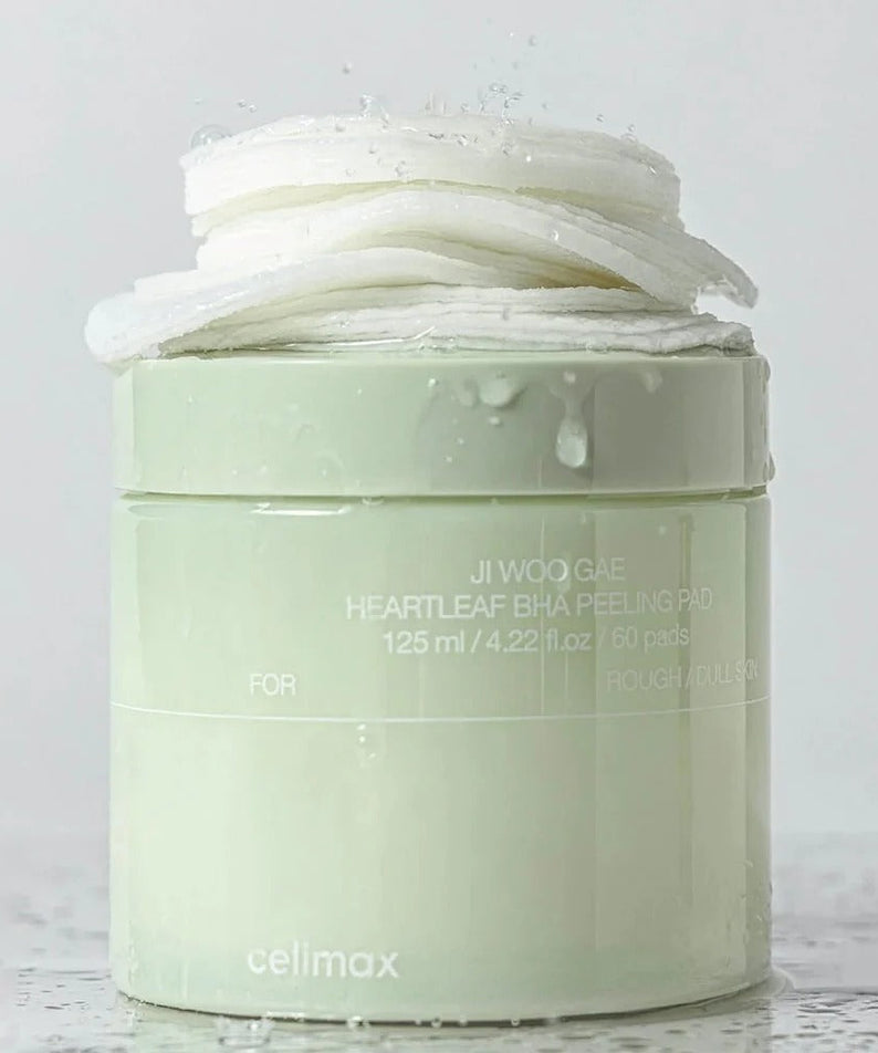 CELIMAX Ji Woo Gae Heartleaf BHA Peeling Pad 60 Pads in light green container with white pads stacked on top.