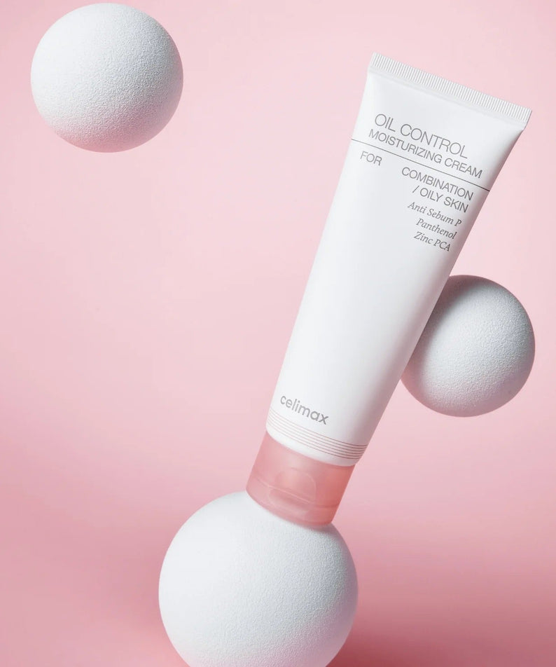 CELIMAX Oil Control Moisturizing Cream 80ml on a pink background with white spheres