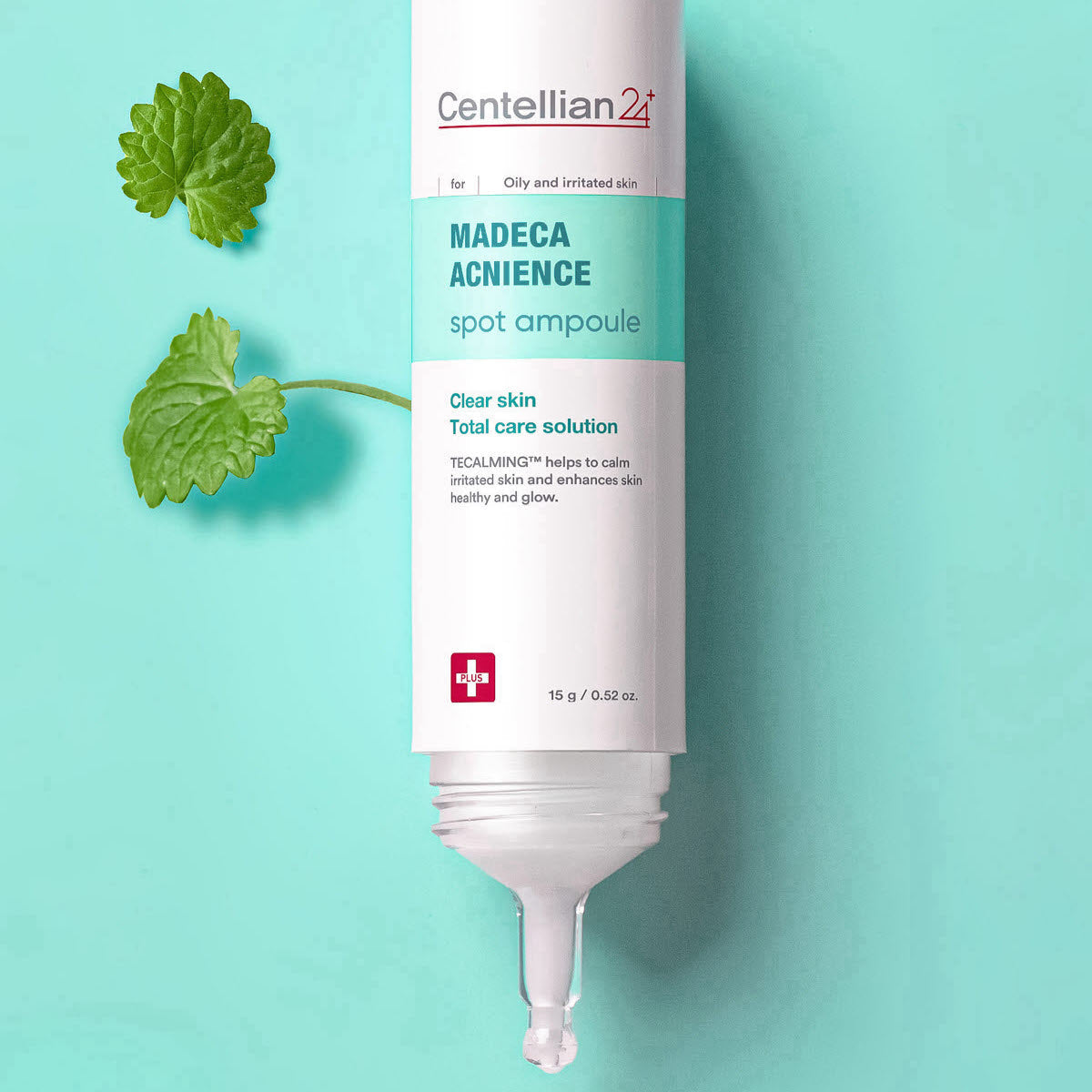 CENTELLIAN 24 Madeca Acne Spot Care 15ml tube on a turquoise background with green leaves.