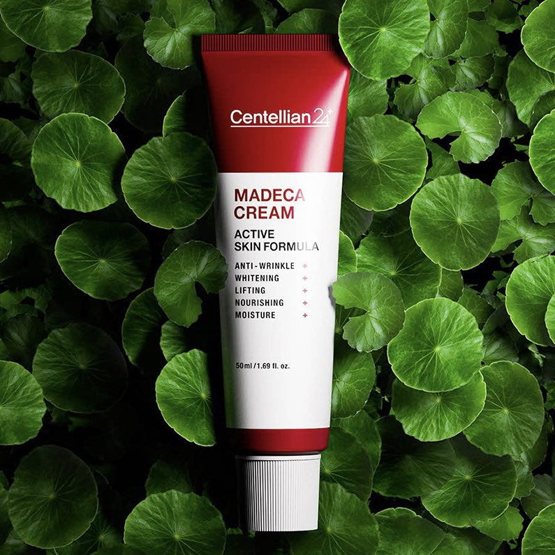 CENTELLIAN 24 Madeca Cream Active Skin Formula 50ml tube on green leaves background
