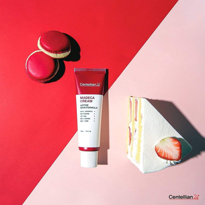 CENTELLIAN 24 Madeca Cream Active Skin Formula 50ml tube on colorful background with dessert.