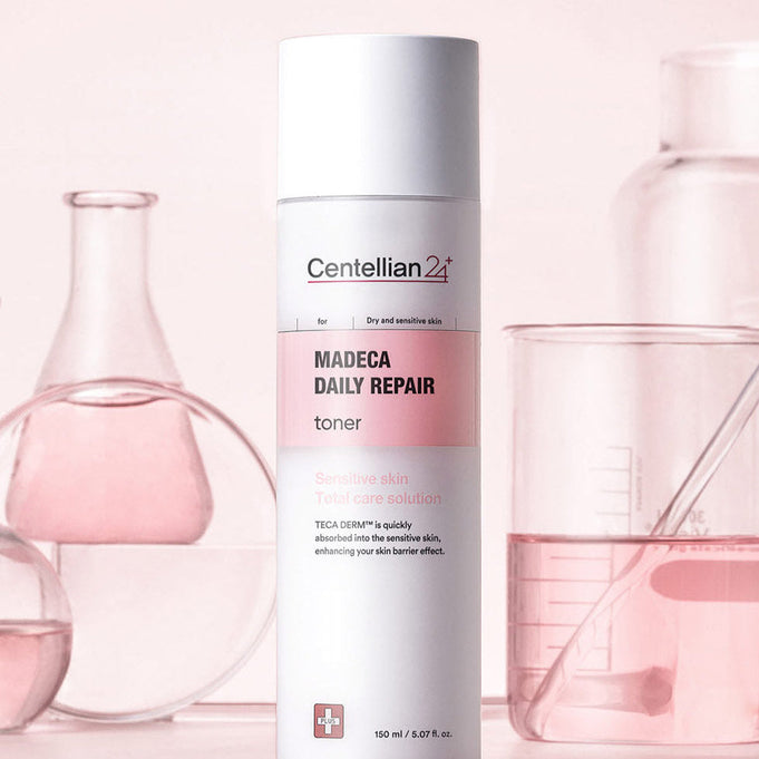 CENTELLIAN 24 Madeca Daily Repair Toner 150ml bottle in front of pink lab glassware, designed for sensitive skin repair.