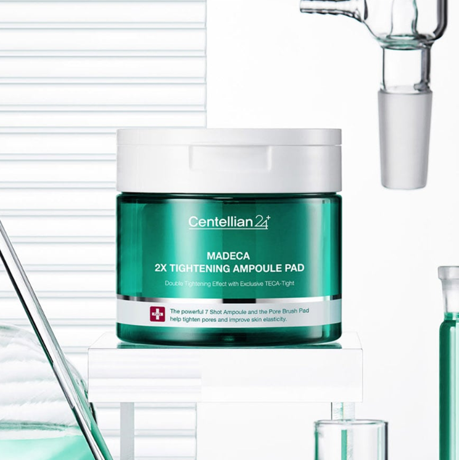 CENTELLIAN 24 Madeca Double Tightening Ampoule Pads (60 sheets) in green packaging on a white background with dropper.