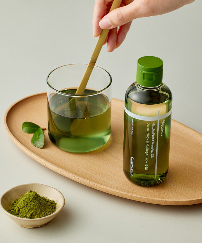 CENTELLIAN 24 Madeca Matcha Cleansing Oil 200ml bottle on tray with matcha powder and drink