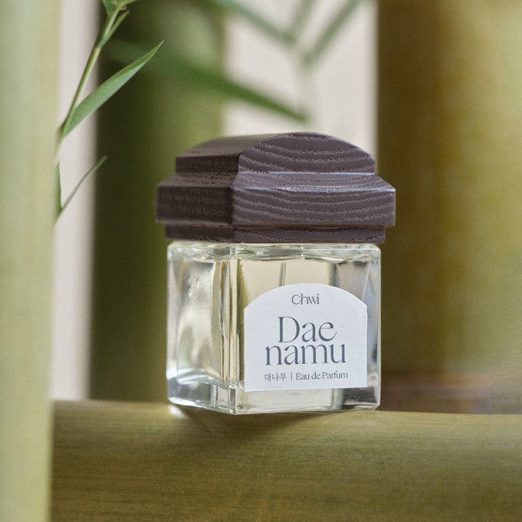 CHWI (CHI) Eau De Parfume 50ml bottle on natural background showcasing elegant design and premium branding.