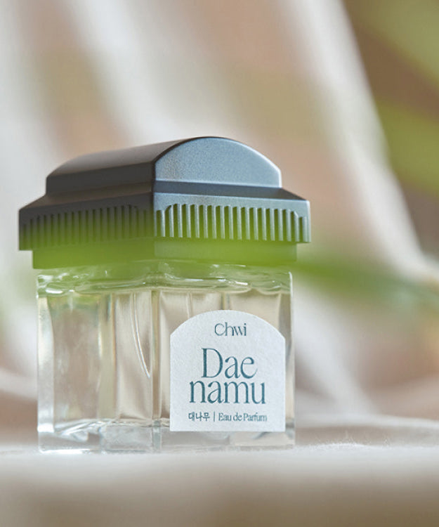 CHWI (CHI) Eau De Parfume 50ml bottle displayed on a light background with green accents.