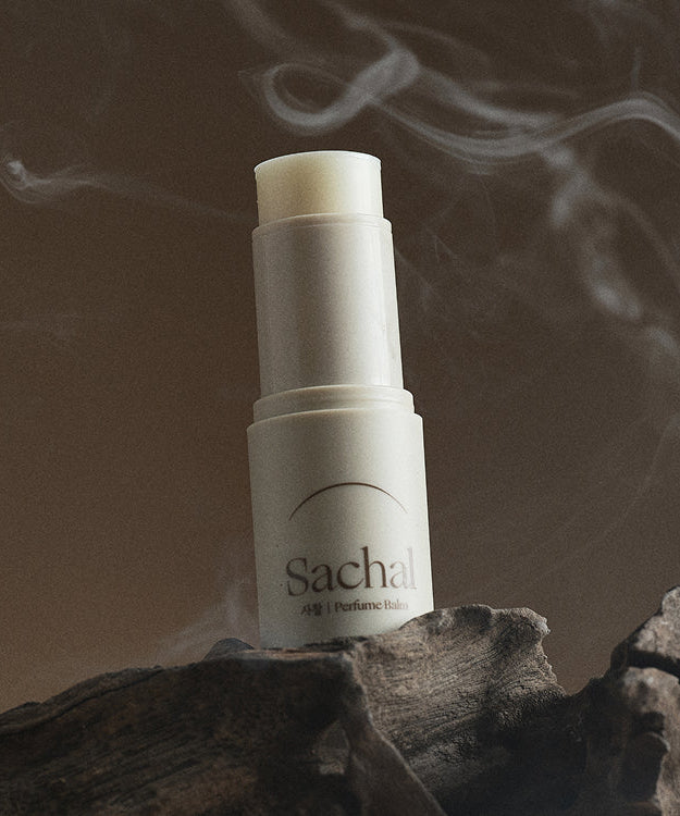 CHWI (CHI) Parfume Balm 4.6g displayed with elegant design and natural setting