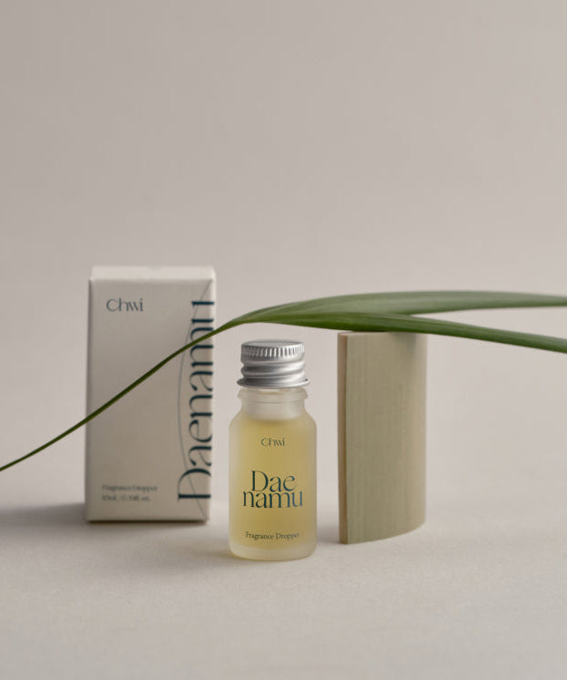 CHWI (CHI) Dae Namu Frangrance Dropper 10ml bottle with packaging and green leaf display.