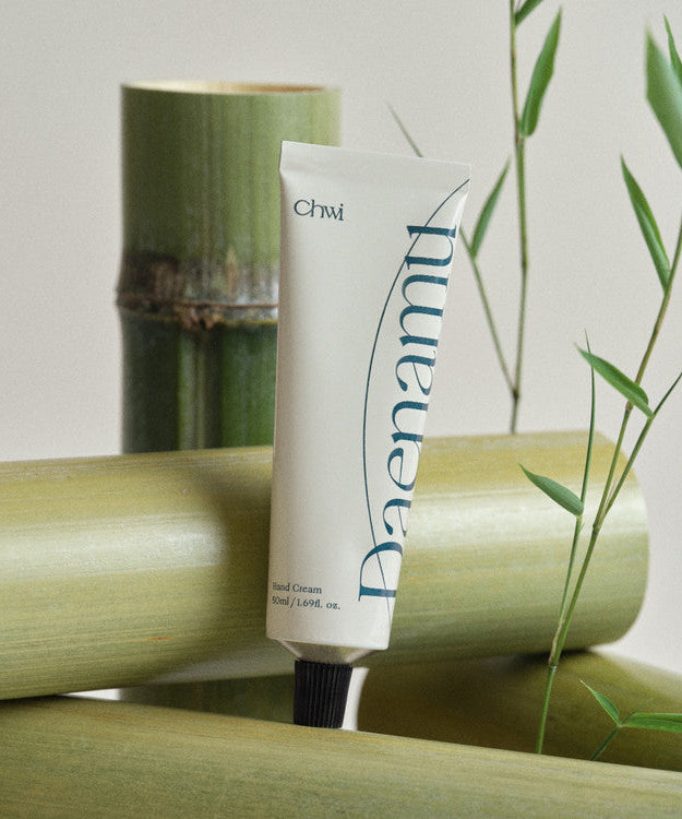 CHWI (CHI) Dae Namu Hand Cream 50ml with bamboo backdrop emphasizing natural ingredients.