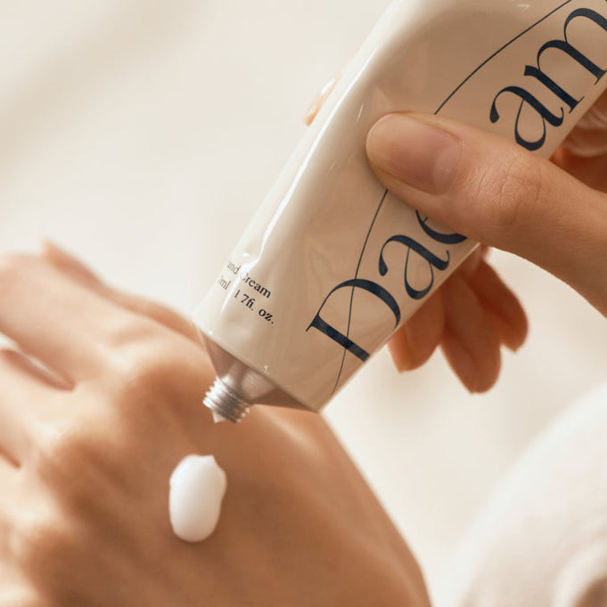 Applying CHWI (CHI) Dae Namu Hand Cream 50ml on hand for hydration