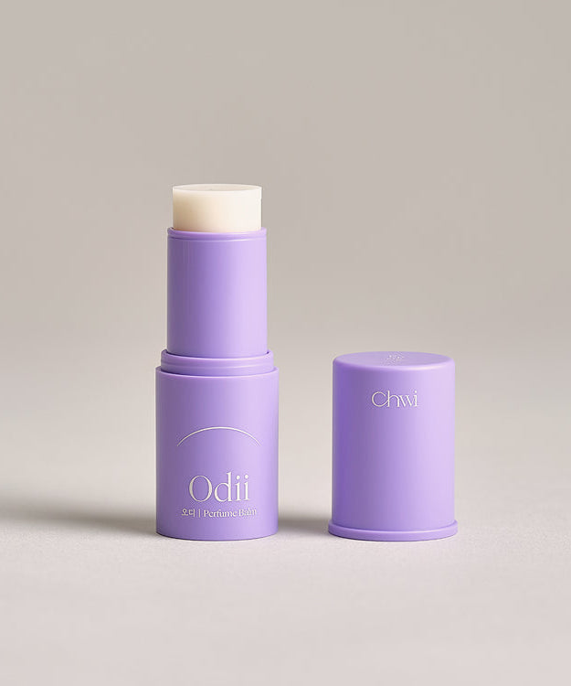 Purple CHWI (CHI) Odii Parfume Balm 4.6g in open container with cap beside, showcasing the balm stick for fragrance application.