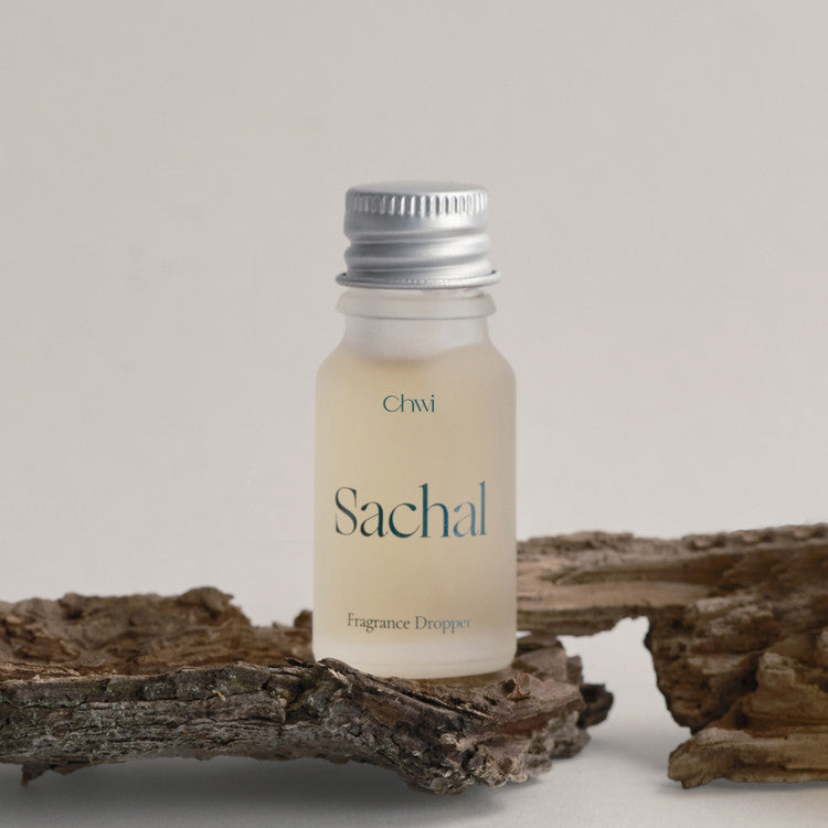 CHWI (CHI) Sachak Fraangrance Dropper 10ml on wooden background
