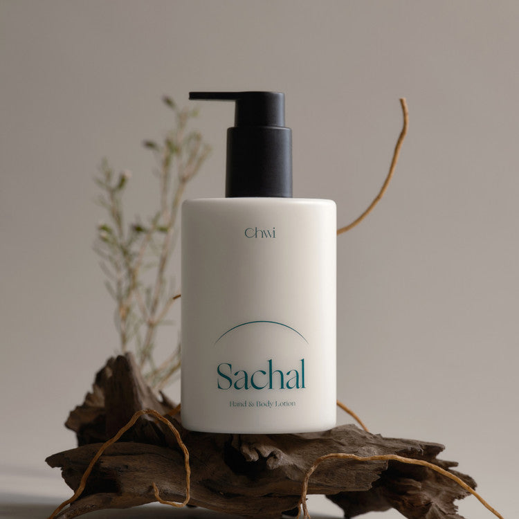 Bottle of CHWI (CHI) Sachal Hand & Body Lotion 300ml on natural wood display
