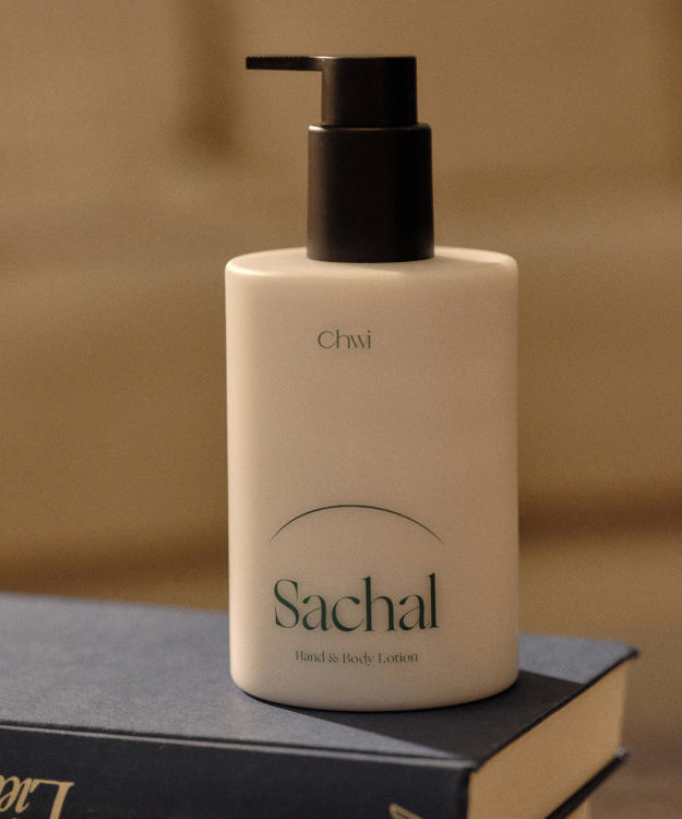 CHWI (CHI) Sachal Hand & Body Lotion 300ml bottle on a book
