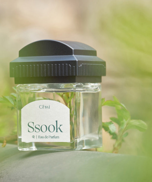 CHWI (CHI) Ssook Parfume 50ml bottle outdoors with green leaves