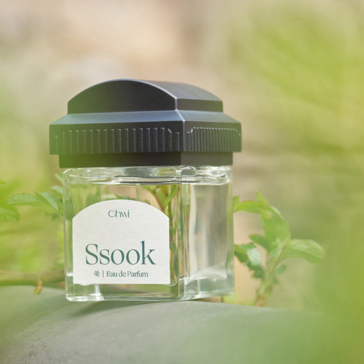 CHWI (CHI) Ssook Parfume 50ml bottle outdoors with green leaves