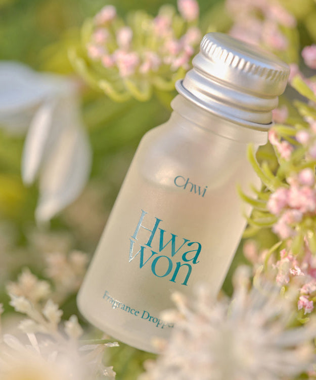 CHWI (CHI) Wha Won Fragrance Dropper 10ml amid blooming flowers
