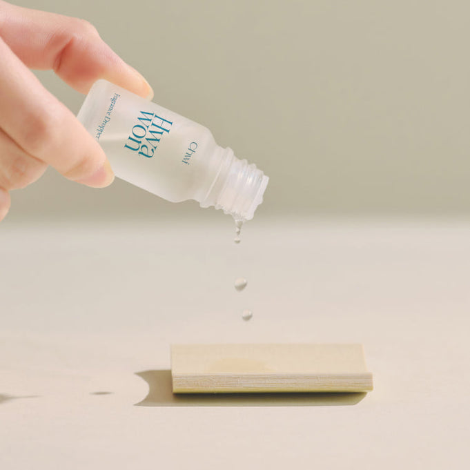 CHWI (CHI) Wha Won Fragrance Dropper 10ml being poured onto a surface
