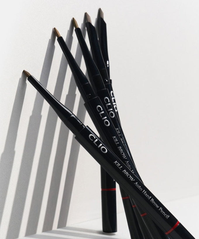 CLIO Kill Brow Auto Hard Brow Pencil lineup showcasing angled tips in stylish black packaging.