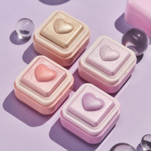 COLORGRAM Milk Bling Heartlighter in assorted colors with heart-shaped designs