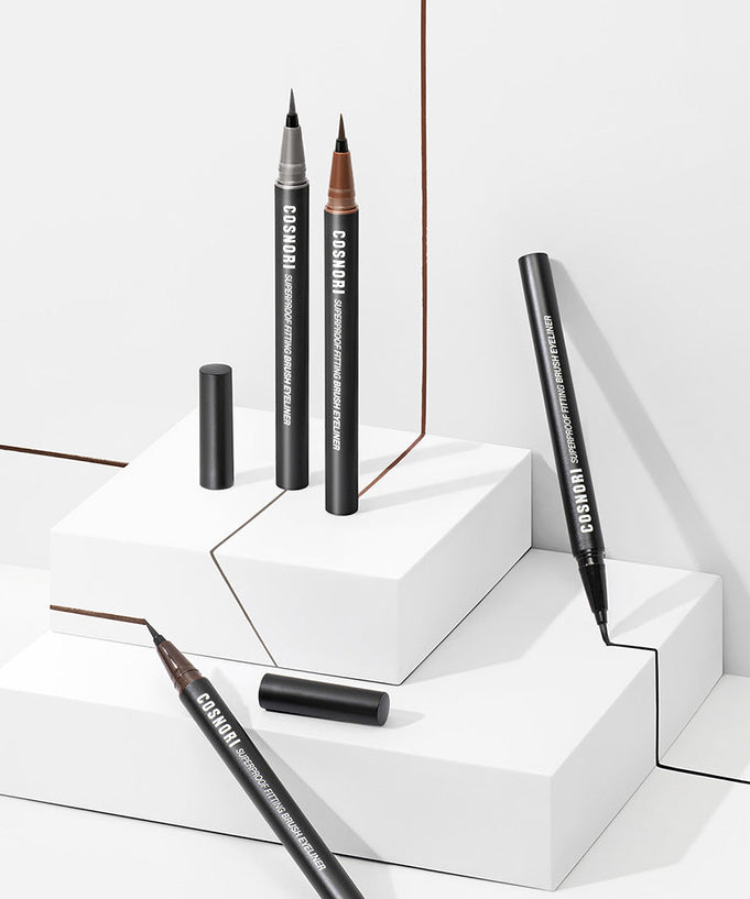 COSNORI Superproof Fiting Brush Eyeliner display on geometric white blocks.