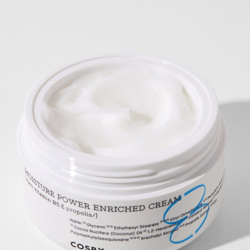 COSRX Hydrium Moisture Power Enriched Cream 50ml in an open jar showing creamy texture.
