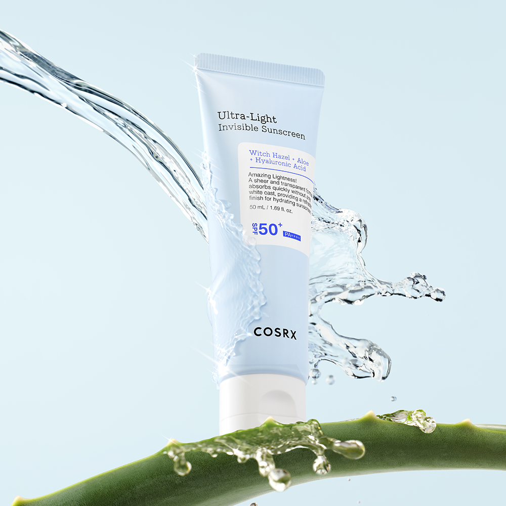 COSRX Ultra-Light Invisible Sunscreen SPF50+ PA++++ 50ml tube with aloe and water splash, highlighting its refreshing formula.