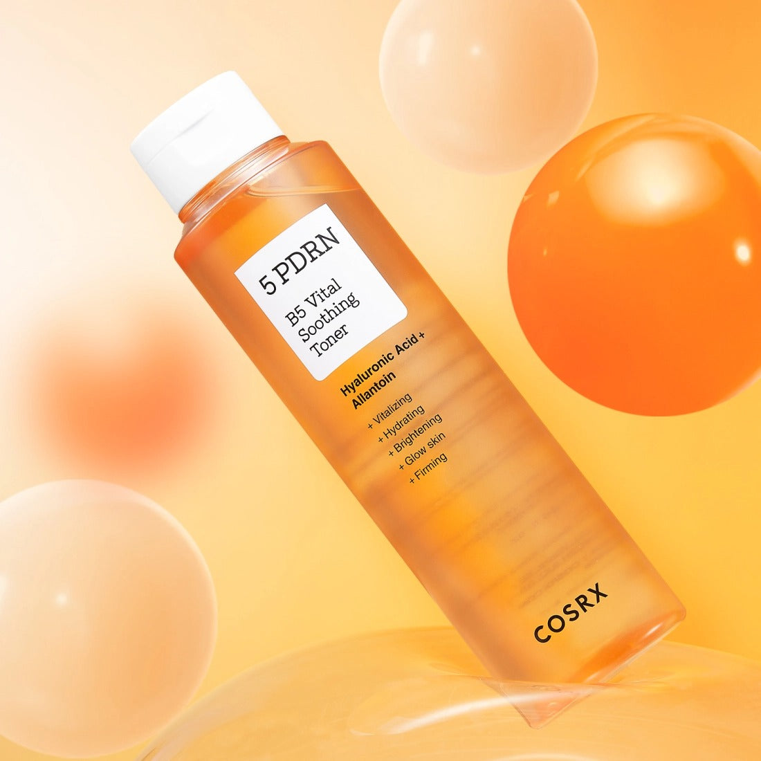 COSRX 5 PDRN B5 Vital Soothing Toner with Hyaluronic Acid and Allantoin, 100ml product bottle image with orange bubbles.