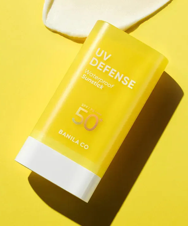 BANILACO UV Defense Waterproof Sun Stick SP50+ PA++++ with yellow packaging on a bright background.