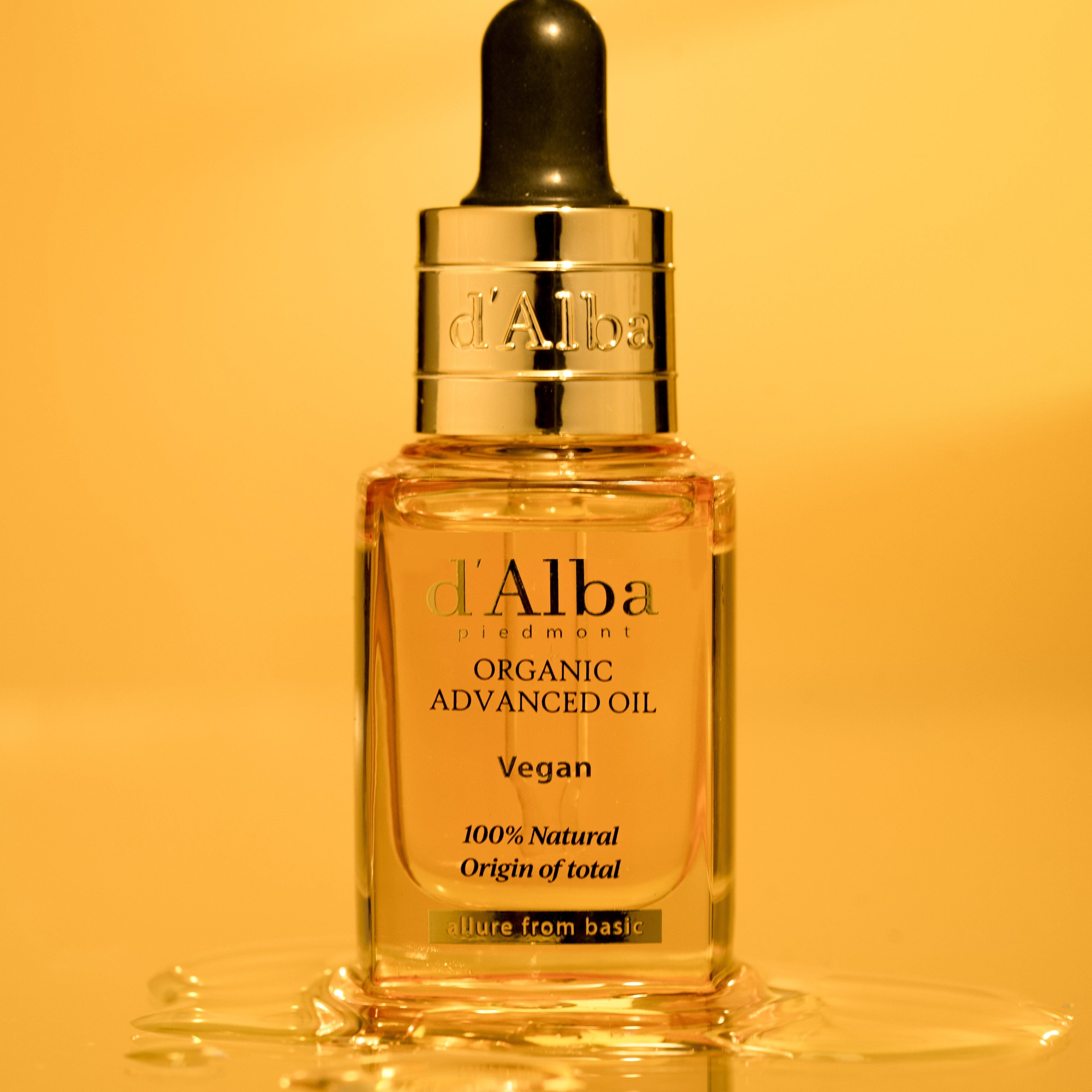 D'ALBA Organic Advanced Oil 17ml bottle with dropper on amber background